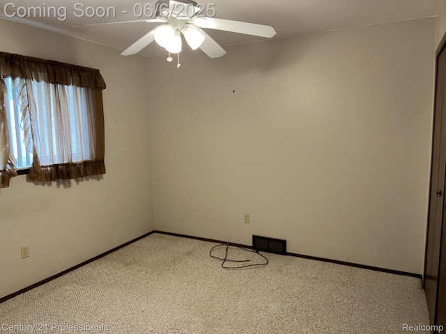 3028 Earl Dr, Warren, MI 48092 - carpeted spare room featuring a ceiling fan and baseboards