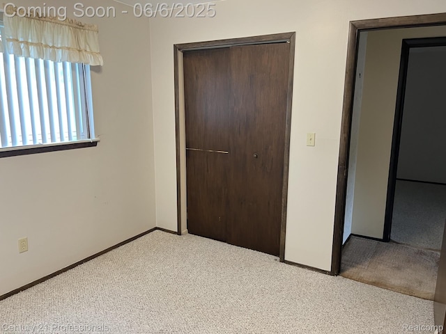 3028 Earl Dr, Warren, MI 48092 - unfurnished bedroom featuring carpet floors, a closet, and baseboards