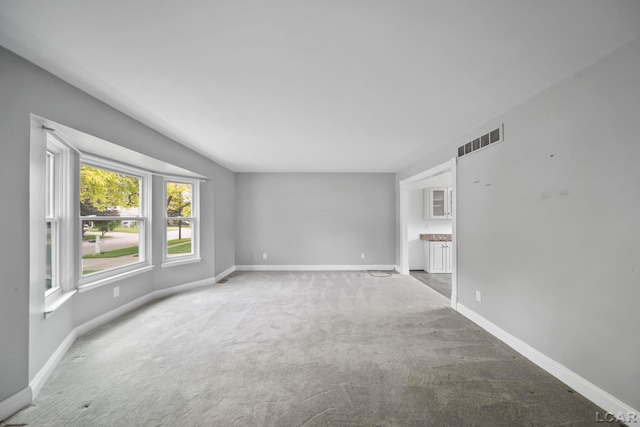 5662 Caren Dr, Ypsilanti, MI 48197 - unfurnished room featuring carpet floors and baseboards