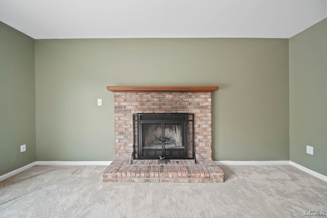5662 Caren Dr, Ypsilanti, MI 48197 - detailed view of carpet, baseboards, and a brick fireplace