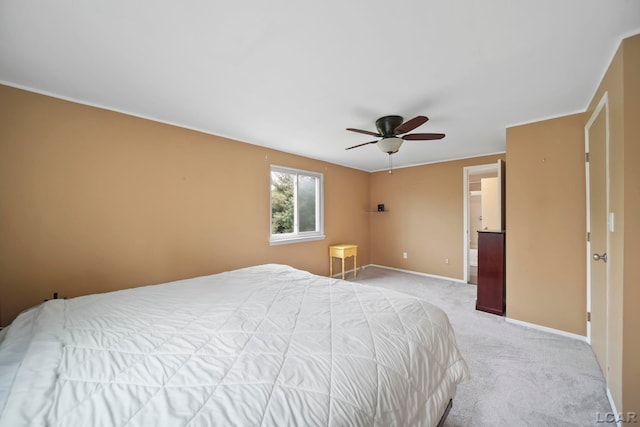 5662 Caren Dr, Ypsilanti, MI 48197 - bedroom featuring light carpet, baseboards, and a ceiling fan