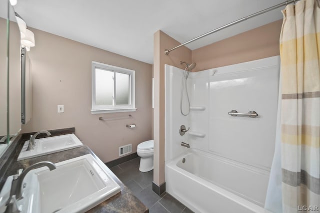 5662 Caren Dr, Ypsilanti, MI 48197 - bathroom with toilet, shower / tub combo, tile patterned floors, double vanity, and baseboards