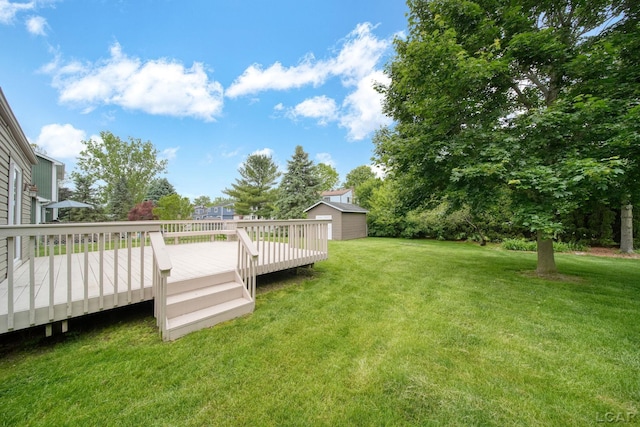 5662 Caren Dr, Ypsilanti, MI 48197 - view of grassy yard with a wooden deck