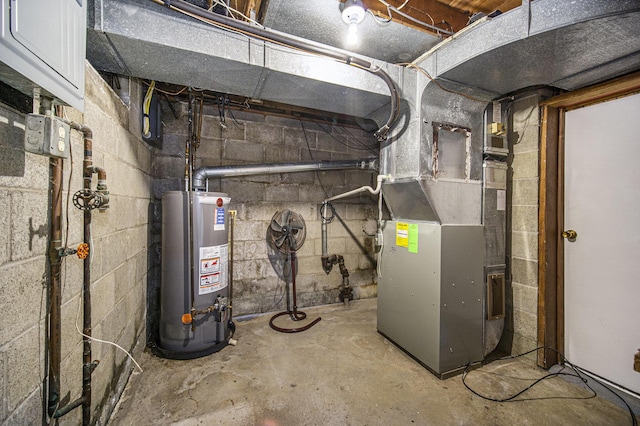 111 N Maple Rd, Saline, MI 48176 - utility room with water heater and heating unit