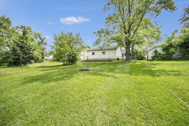 111 N Maple Rd, Saline, MI 48176 - view of yard with a fire pit