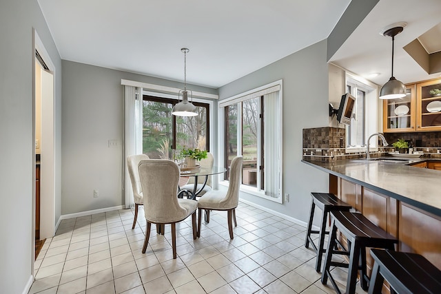 3329 Craig Rd, Ann Arbor, MI 48103 - dining area featuring baseboards and light tile patterned flooring