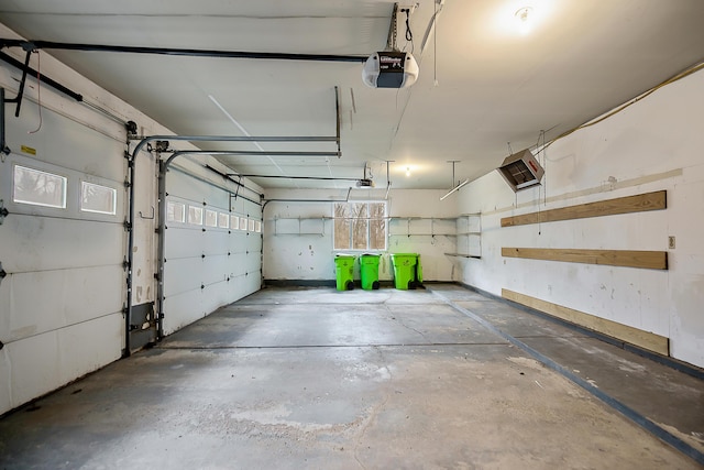 3329 Craig Rd, Ann Arbor, MI 48103 - garage featuring a garage door opener