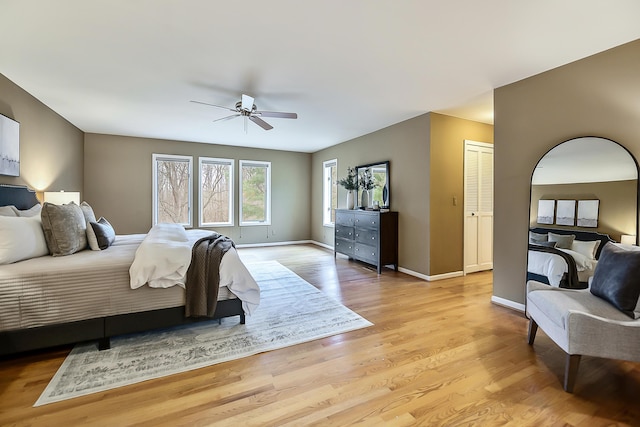 3329 Craig Rd, Ann Arbor, MI 48103 - bedroom featuring light wood-type flooring, baseboards, and ceiling fan