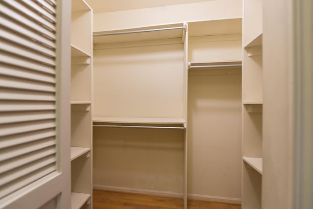 3329 Craig Rd, Ann Arbor, MI 48103 - walk in closet with light wood finished floors