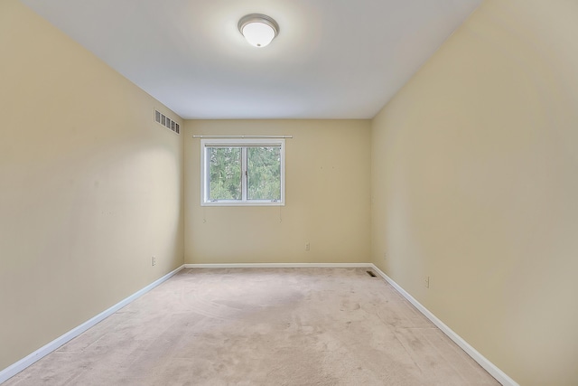 3329 Craig Rd, Ann Arbor, MI 48103 - empty room featuring baseboards and light carpet