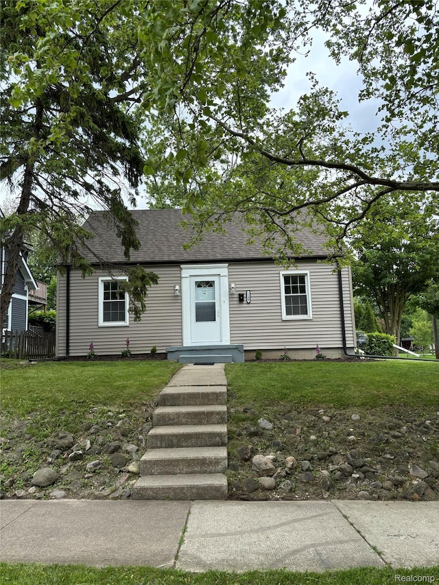 1139 S 7th St, Ann Arbor, MI 48103 - view of front of home featuring roof with shingles