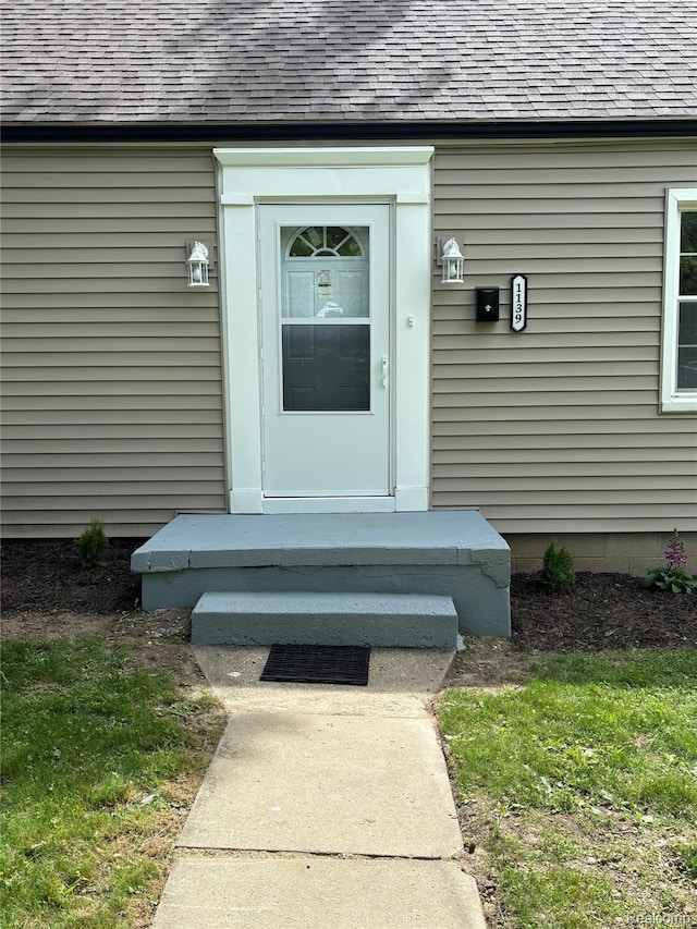 1139 S 7th St, Ann Arbor, MI 48103 - doorway to property with roof with shingles