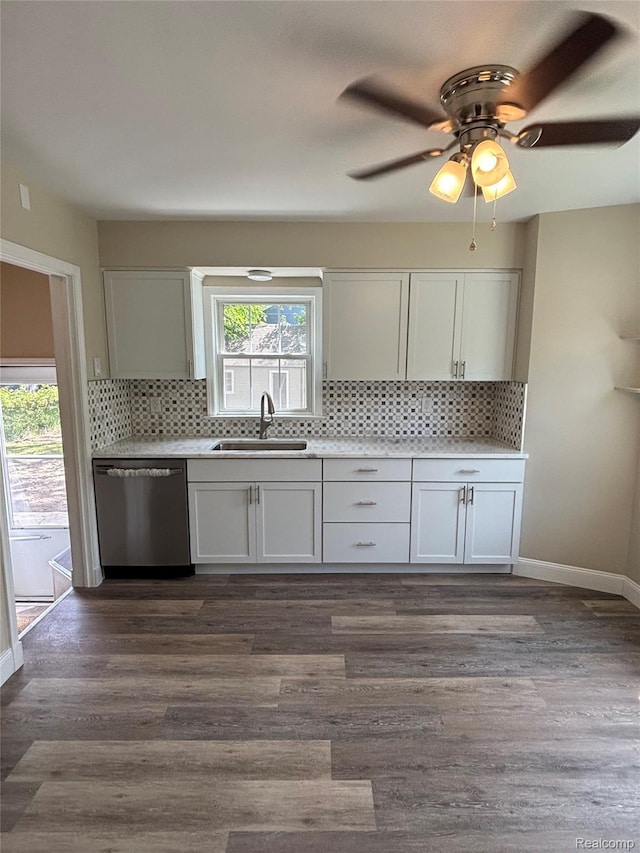 1139 S 7th St, Ann Arbor, MI 48103 - kitchen featuring dishwasher, a sink, tasteful backsplash, and light countertops