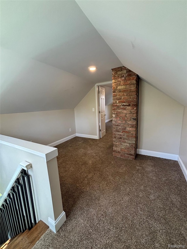 1139 S 7th St, Ann Arbor, MI 48103 - bonus room featuring lofted ceiling, carpet floors, and baseboards