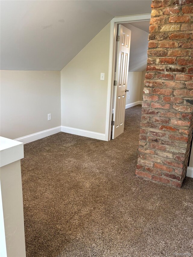 1139 S 7th St, Ann Arbor, MI 48103 - bonus room featuring carpet floors, baseboards, and vaulted ceiling