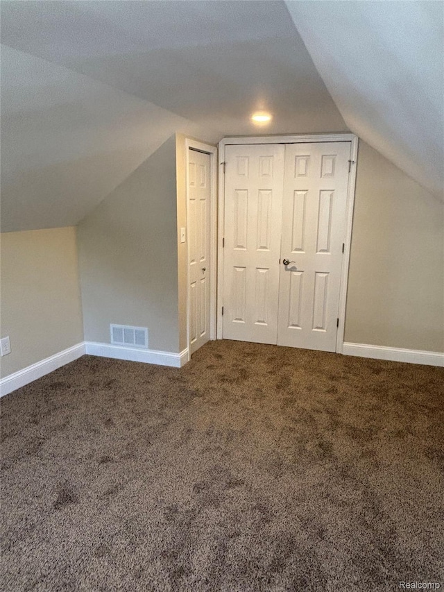 1139 S 7th St, Ann Arbor, MI 48103 - bonus room with carpet floors, lofted ceiling, and baseboards