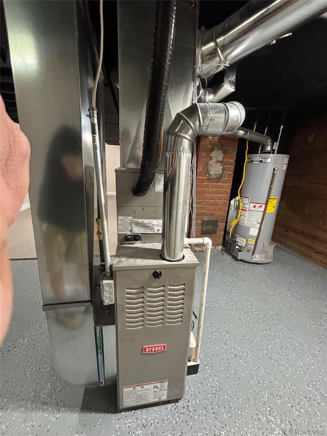 1139 S 7th St, Ann Arbor, MI 48103 - utility room featuring water heater and heating unit