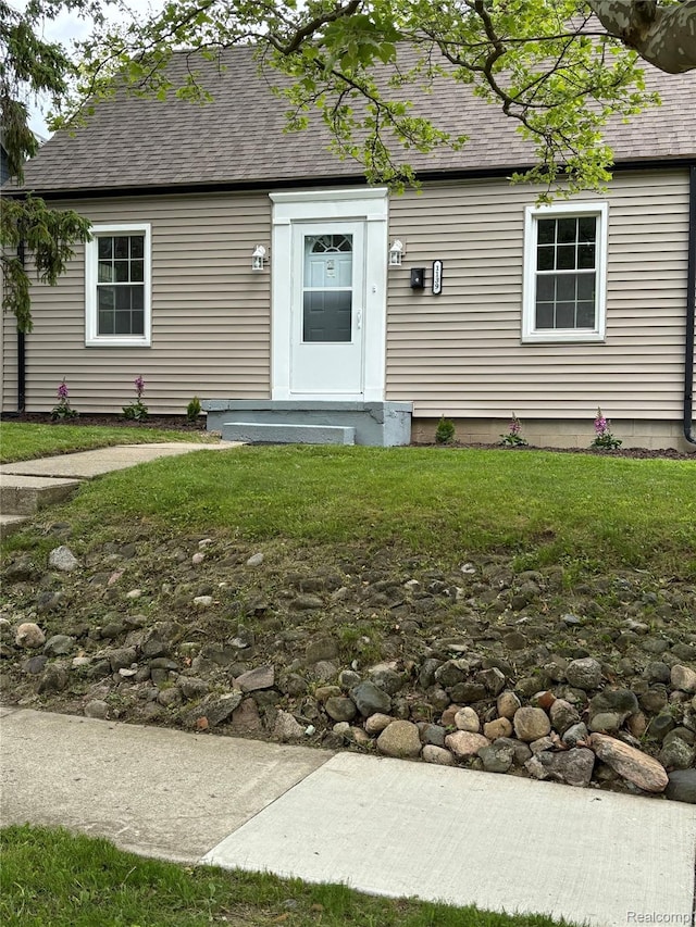 1139 S 7th St, Ann Arbor, MI 48103 - view of front of home featuring roof with shingles