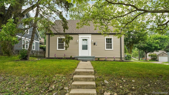 1139 S 7th St, Ann Arbor, MI 48103 - cape cod home with a shingled roof