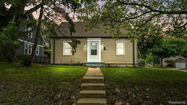 1139 S 7th St, Ann Arbor, MI 48103 - view of front facade with a shingled roof
