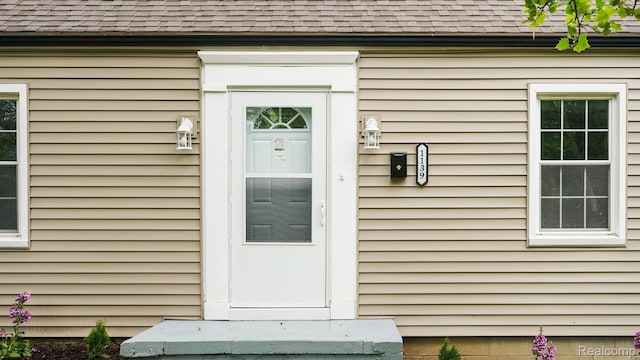 1139 S 7th St, Ann Arbor, MI 48103 - entrance to property with a shingled roof