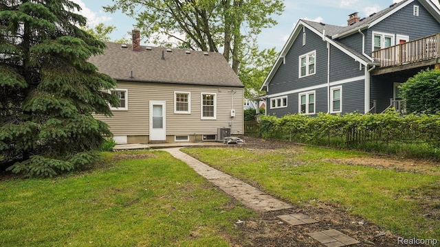 1139 S 7th St, Ann Arbor, MI 48103 - back of house with a chimney