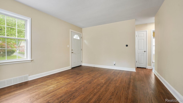 1139 S 7th St, Ann Arbor, MI 48103 - unfurnished room featuring dark wood finished floors and plenty of natural light