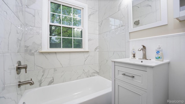1139 S 7th St, Ann Arbor, MI 48103 - bathroom with vanity, shower / bathtub combination, and wainscoting
