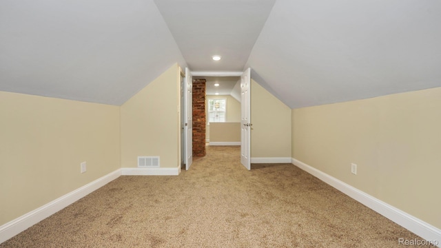 1139 S 7th St, Ann Arbor, MI 48103 - additional living space with carpet, lofted ceiling, and recessed lighting
