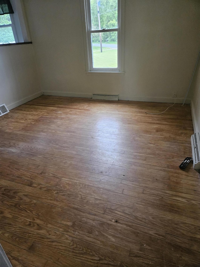 2745 Riverside Rd, Benton Harbor, MI 49022 - spare room featuring dark wood finished floors and baseboards