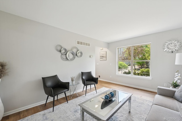 1011 Knowles St, Royal Oak, MI 48067 - living room featuring wood finished floors and baseboards