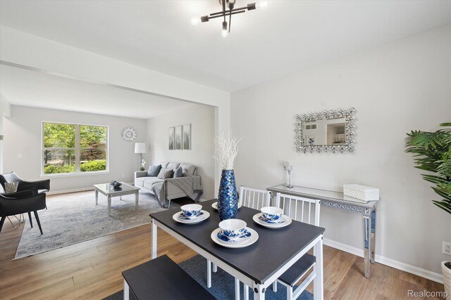 1011 Knowles St, Royal Oak, MI 48067 - dining room with light wood-style flooring and baseboards
