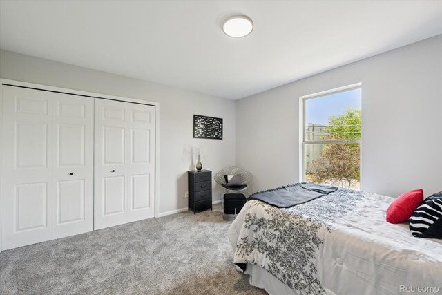 1011 Knowles St, Royal Oak, MI 48067 - carpeted bedroom featuring a closet and baseboards