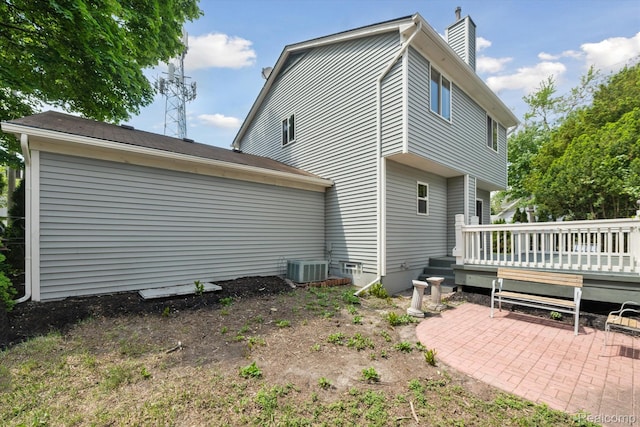 1011 Knowles St, Royal Oak, MI 48067 - back of property with a patio, a wooden deck, a chimney, and cooling unit