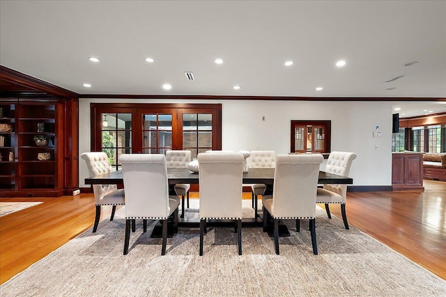490 E Long Lake Rd, Bloomfield Hills, MI 48304 - dining space with crown molding, light wood-style flooring, recessed lighting, plenty of natural light, and baseboards