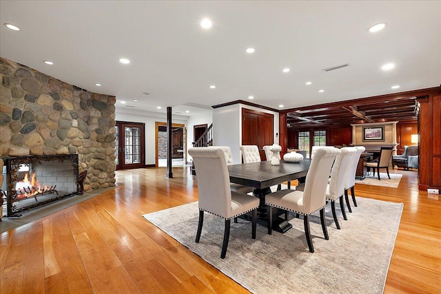 490 E Long Lake Rd, Bloomfield Hills, MI 48304 - dining area featuring light wood-style floors, a fireplace, and recessed lighting