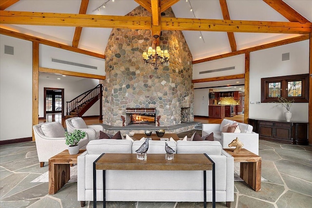 490 E Long Lake Rd, Bloomfield Hills, MI 48304 - living area featuring high vaulted ceiling, stone floors, a chandelier, beam ceiling, and a fireplace