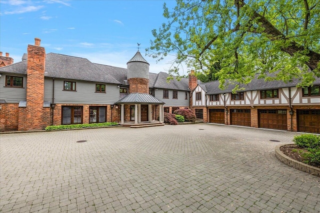 490 E Long Lake Rd, Bloomfield Hills, MI 48304 - view of front of house featuring brick siding, a gazebo, curved driveway, and a residential view