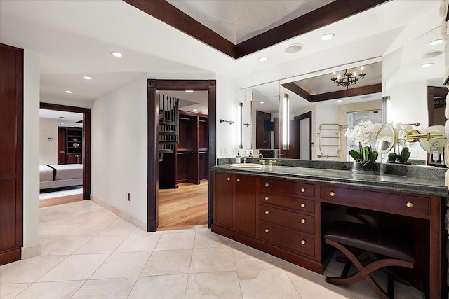 490 E Long Lake Rd, Bloomfield Hills, MI 48304 - ensuite bathroom with vanity, baseboards, tile patterned flooring, recessed lighting, and a chandelier