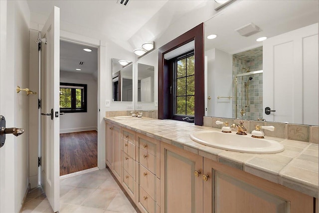 490 E Long Lake Rd, Bloomfield Hills, MI 48304 - bathroom featuring double vanity, a stall shower, baseboards, recessed lighting, and tile patterned floors
