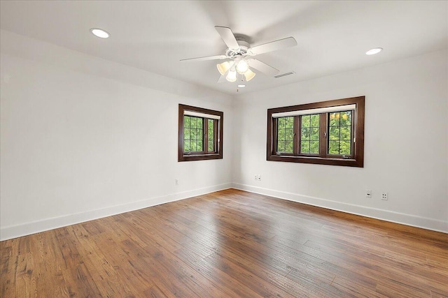 490 E Long Lake Rd, Bloomfield Hills, MI 48304 - unfurnished room with baseboards, a ceiling fan, hardwood / wood-style flooring, and recessed lighting
