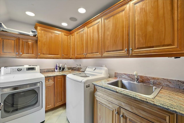 490 E Long Lake Rd, Bloomfield Hills, MI 48304 - laundry area with cabinet space, washer and clothes dryer, light tile patterned floors, and recessed lighting