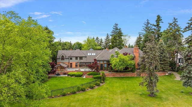 490 E Long Lake Rd, Bloomfield Hills, MI 48304 - rear view of house featuring a deck and a chimney