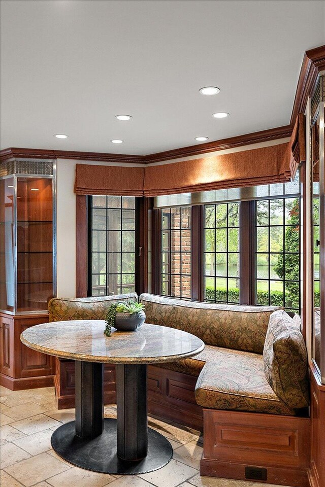 490 E Long Lake Rd, Bloomfield Hills, MI 48304 - dining room with breakfast area, plenty of natural light, recessed lighting, crown molding, and stone tile flooring