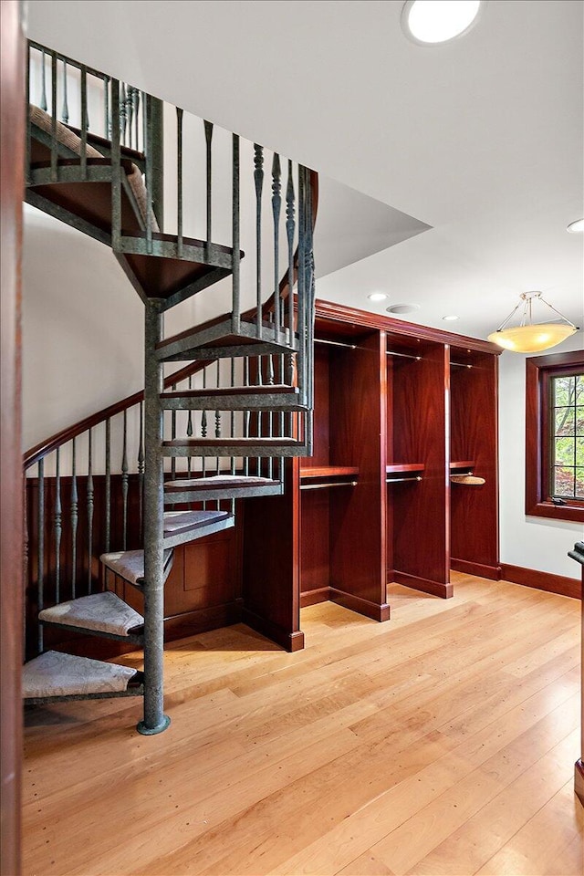 490 E Long Lake Rd, Bloomfield Hills, MI 48304 - stairs with hardwood / wood-style floors, baseboards, and recessed lighting