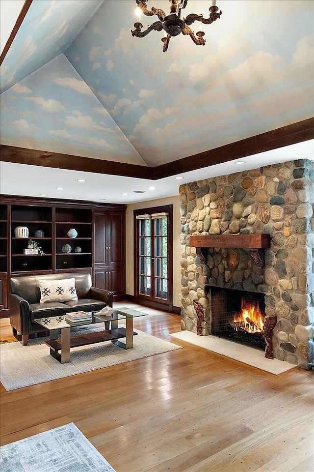 490 E Long Lake Rd, Bloomfield Hills, MI 48304 - living area with vaulted ceiling, a fireplace, hardwood / wood-style flooring, and recessed lighting