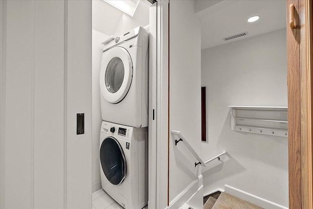 490 E Long Lake Rd, Bloomfield Hills, MI 48304 - washroom with stacked washer and clothes dryer, baseboards, and recessed lighting