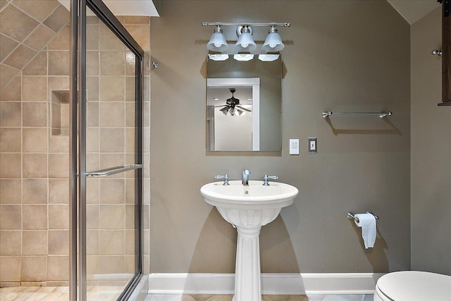 490 E Long Lake Rd, Bloomfield Hills, MI 48304 - bathroom with a shower stall, toilet, a ceiling fan, and baseboards