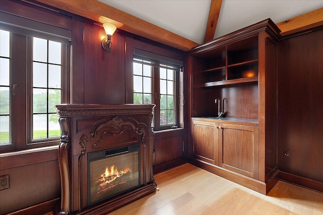 490 E Long Lake Rd, Bloomfield Hills, MI 48304 - office area with a glass covered fireplace, light wood-style floors, a sink, and beamed ceiling