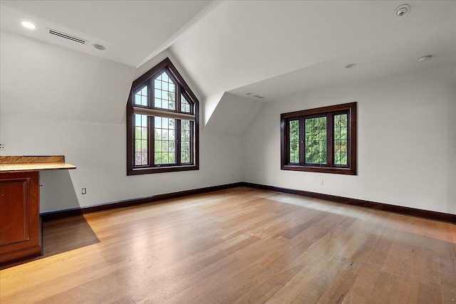 490 E Long Lake Rd, Bloomfield Hills, MI 48304 - bonus room featuring healthy amount of natural light, light wood-style flooring, lofted ceiling, baseboards, and recessed lighting